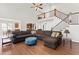 Living room with high ceilings and large sectional sofa for maximum comfort at 12812 Baybriar Dr, Raleigh, NC 27613