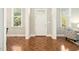 Entry way featuring beautiful hardwood flooring and natural light at 1309 Langdon Pl, Pittsboro, NC 27312