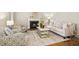 Cozy living room featuring a fireplace, neutral colors, and comfortable seating at 1309 Langdon Pl, Pittsboro, NC 27312