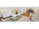 Comfortable living area with hardwood floors, a fireplace, and great light at 1309 Langdon Pl, Pittsboro, NC 27312