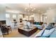 Spacious living room with hardwood floors, open to kitchen and dining area at 150 Green Haven Blvd # 67, Youngsville, NC 27596