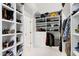 Spacious walk-in closet with custom shelving and storage solutions at 1925 Banbury Rd, Raleigh, NC 27608