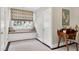 Charming window seat with patterned cushions, ample natural light, and a cozy atmosphere at 1925 Banbury Rd, Raleigh, NC 27608