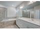 Luxurious bathroom featuring double vanity sinks, large mirror, and a separate shower and tub at 195 Duncan Creek Rd # 123, Lillington, NC 27546