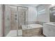 Elegant bathroom showcasing a glass enclosed shower, soaking tub, and stylish tile at 195 Duncan Creek Rd # 123, Lillington, NC 27546