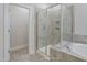 Bathroom with tile shower and tub at 195 Duncan Creek Rd # 123, Lillington, NC 27546