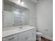 Bright bathroom featuring a large mirror and vanity with sink and ample counter space at 195 Duncan Creek Rd # 123, Lillington, NC 27546