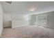 Spacious bonus room with plush carpeting, neutral paint, and natural light from double windows at 195 Duncan Creek Rd # 123, Lillington, NC 27546
