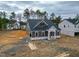 Stylish single-story home with gray siding and clean lines, set in a developing neighborhood at 195 Duncan Creek Rd # 123, Lillington, NC 27546