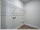 Dedicated laundry room with washer and dryer hookups and wire shelving at 195 Duncan Creek Rd # 123, Lillington, NC 27546