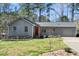 Charming single story home with a neutral paint and mature trees at 2 Edgestone Pl, Chapel Hill, NC 27517