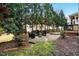 View of a full patio seating set in this well-maintained backyard at 2006 Prairie Ridge Ct, Fuquay Varina, NC 27526