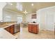 Open kitchen with eat in breakfast area, stainless steel appliances, and tile floors at 2006 Prairie Ridge Ct, Fuquay Varina, NC 27526