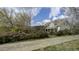 Charming home featuring a well-maintained exterior, fenced front yard, and inviting curb appeal at 2121 Allensville Rd, Roxboro, NC 27574