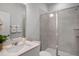 Clean bathroom with a glass shower door, quartz countertop, and modern fixtures at 217 Duncan Creek Rd # 124, Lillington, NC 27546