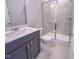Modern bathroom with vanity, tiled shower, and neutral color scheme at 217 Duncan Creek Rd # 124, Lillington, NC 27546