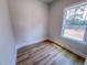 Cozy bedroom with neutral walls, plush carpet, and a large window offering natural light at 217 Duncan Creek Rd # 124, Lillington, NC 27546