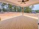 Large wooden deck with ceiling fan, perfect for outdoor entertaining and relaxing at 217 Duncan Creek Rd # 124, Lillington, NC 27546