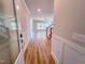 Inviting entryway with wood-look floors leading to the main living area and staircase at 217 Duncan Creek Rd # 124, Lillington, NC 27546