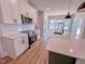 Modern kitchen with stainless steel appliances, quartz countertops, and white subway tile backsplash at 217 Duncan Creek Rd # 124, Lillington, NC 27546