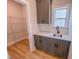 Butler pantry with gray cabinets, sink, counter space, and wire shelving in walk-in space at 217 Duncan Creek Rd # 124, Lillington, NC 27546