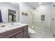 Modern bathroom featuring a glass-enclosed shower, sleek vanity, and contemporary fixtures at 2203 Canterbury Dr, Burlington, NC 27215