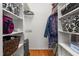 Organized walk-in closet with shelving and storage solutions for clothes and accessories at 2203 Canterbury Dr, Burlington, NC 27215