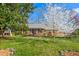 Charming brick home featuring mature trees and a well-maintained lawn in a desirable neighborhood at 2203 Canterbury Dr, Burlington, NC 27215