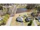 Aerial view of a single Gathering home with a large pond in the backyard at 248 Brookfield Cir, Sanford, NC 27330