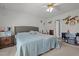 A spacious bedroom provides a calm retreat with ample natural light and classic decor at 248 Brookfield Cir, Sanford, NC 27330