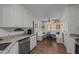 The kitchen features a cozy breakfast nook, granite countertops, and stainless steel dishwasher at 248 Brookfield Cir, Sanford, NC 27330