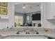 A unique kitchen sink offering a view into the adjacent living space, perfect for open-concept living at 248 Brookfield Cir, Sanford, NC 27330