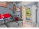 Cozy living area featuring a comfortable couch, decor and a bright entry way at 248 Brookfield Cir, Sanford, NC 27330