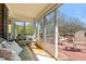 Enjoy indoor-outdoor living with a sunroom leading to a spacious deck, ideal for entertaining and relaxation at 248 Brookfield Cir, Sanford, NC 27330