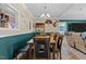 Cozy dining area with a wooden table and chairs, perfect for Gathering meals and gatherings at 2751 Old Fairground Rd, Angier, NC 27501