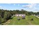 Charming home with green lawn and vehicle providing parking at 2751 Old Fairground Rd, Angier, NC 27501