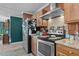 This kitchen includes updated appliances, plenty of counter space, and stylish cabinetry at 2751 Old Fairground Rd, Angier, NC 27501