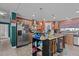 Functional kitchen features a large island, stainless steel appliances, and ample storage at 2751 Old Fairground Rd, Angier, NC 27501