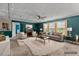 This living room features an inviting layout with cozy seating, bright windows, and stylish decor at 2751 Old Fairground Rd, Angier, NC 27501