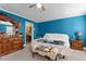 This main bedroom features classic furniture and great light at 2751 Old Fairground Rd, Angier, NC 27501