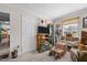 Untidy room cluttered with boxes, a TV, furniture, and miscellaneous items at 2751 Old Fairground Rd, Angier, NC 27501
