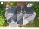 Aerial view of a roof with shingles, a brick patio, and landscaping at 2812 Dahlgreen Rd, Raleigh, NC 27615