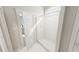 Modern bathroom featuring a glass-enclosed shower with white tile surround at 296 Beacon Dr, Pittsboro, NC 27312
