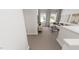 Cozy loft area with comfortable seating, bright windows, and a modern aesthetic at 296 Beacon Dr, Pittsboro, NC 27312