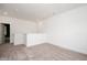 Upstairs loft area with neutral walls, carpet, and white trim offers a versatile living space at 296 Beacon Dr, Pittsboro, NC 27312
