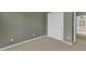 Empty bedroom with carpet, neutral paint, and closet at 3001 Imperial Oaks Dr, Raleigh, NC 27614