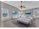 Spacious bedroom has a ceiling fan and dual windows for plenty of natural light at 3001 Imperial Oaks Dr, Raleigh, NC 27614