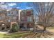 Brick two-story home with balcony and covered patio at 3001 Imperial Oaks Dr, Raleigh, NC 27614
