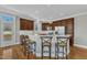 Eat-in kitchen boasts granite counters, stainless appliances, breakfast bar and hardwood floors at 3001 Imperial Oaks Dr, Raleigh, NC 27614