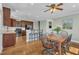 Open kitchen with stainless appliances, granite counters, and breakfast bar seating at 3001 Imperial Oaks Dr, Raleigh, NC 27614